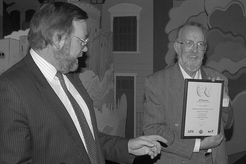 John B Anderson receives the certificate